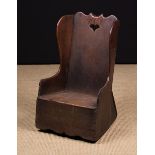 A 19th Century Boarded Oak Child's Rocking Chair.