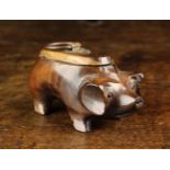 A Carved Lignum Snuff Box in the form of a Pig with inset bead eyes and lid to it's back fitted