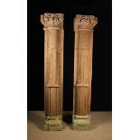 A Pair of Large Antique Architectural Stripped Wooden Pillars on carved stone plinths with traces