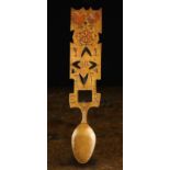 A 19th Century Welsh Sycamore Folk Art Love Spoon on a decorative handle pierced with hearts and