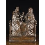 A Rare Plaster Cast Plaque depicting Saint Anne with The Virgin & Child,