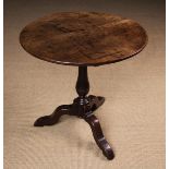 An 18th Century Oak Tilt Top Tripod Table.