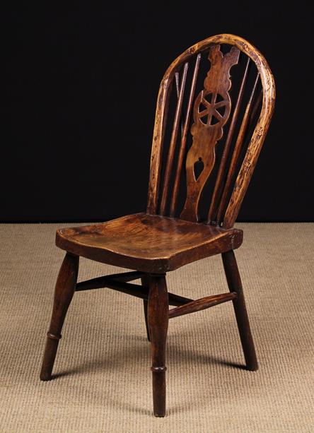 A Small 19th Century Child's 'Wheel back' Windsor Side Chair.