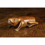 An Early 19th Century Fruitwood Snuff Box in the form of a Frog with gouge carved features and a