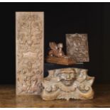 A Group of Four 19th Century Wood Carvings: A Renaissance Revival Panel enriched with relief carved