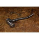 A Cast Metal Mediaeval Hammer with integrated organic branch form handle,