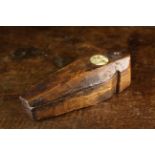 An 18th Century Primitively Carved Elm Coffin-shaped Snuff Box.