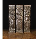 Three 17th Century Carved Oak Figural Terms: Two of them carved with a full length figure of a
