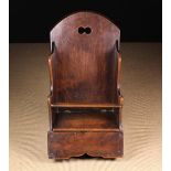 A 19th Century Boarded Mahogany Child's Rocking Chair.