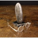 An 18th Century Steel Spectacles Case containing white metal spectacles (probably silver).