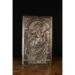 A 17th Century Arcaded Oak Panel relief carved with female figure wearing draped robes and an