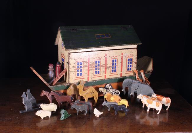 An Early 20th Century Painted Pine Model Ark with Noah & his Wife accompanying a menagerie of