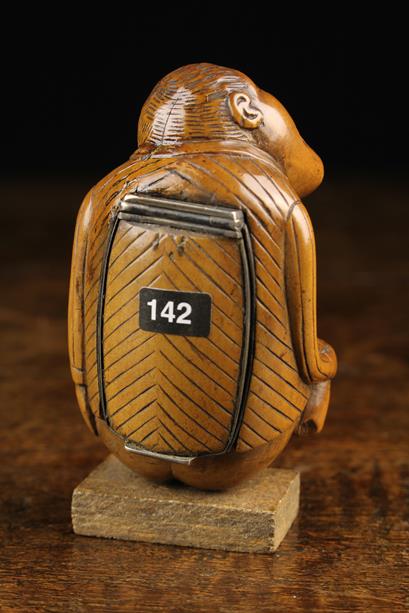 An Early 19th Century Carved Boxwood Snuff Box in the form of a defecating man. - Image 6 of 6