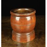 A 19th Century Turned Maple Mortar of fine colour and patination, 7½" (19 cm) high,