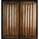 A Pair of 16th Century Carved Linen Fold Panels 29" x 13" (74 cm x 33 cm).