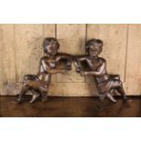 A Pair of Late 17th/Early 18th Century English Carved Oak Putti;