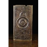 A 17th Century Carved Oak Panel,