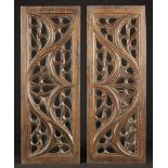 A Pair of 'Gothic' Oak Panels pierced with swirling tracery, 21¾" x 8" (55 cm x 20 cm).