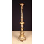 A Tall 18th Century Italian Carved Giltwood Candle Stand.