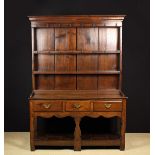 An 18th Century Oak and Fruitwood Dresser with Rack.