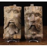 Two 19th Century Carved Oak Corbels emblazoned with face masks of a Green Man (A/F) and Satyr,