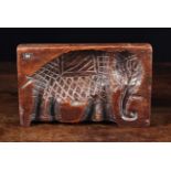 A Charming 18th Century Fruitwood Biscuit Mould gouge carved in the form of an elephant,