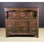 A 17th Century Oak Court Cupboard.