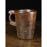 A Large Early 18th Century North European Dug Out Treen Tankard with sgrafitto decoration and