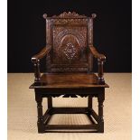 A 17th Century Oak Wainscot Chair.