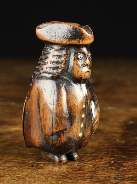 An 18th/19th Century Stained Walnut Snuff Box carved as a bewigged curmudgeonly gentleman with - Image 3 of 4