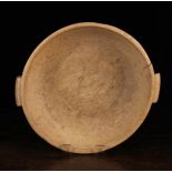 A 19th Century Welsh Turned Sycamore Bowl with lug handles, 3 (9.5 cm) high, 16" (41 cm) in width.