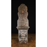 An Oak Wall Hanging Bracket with a moulded ledge above a 17th Century carving of a roaring lion's