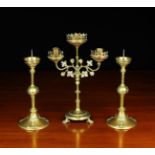 A 19th Century Gothic Revival Brass Candleabra with three candle sockets within trefoil galleried