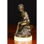 A Bronze Figure of Young Female Bather sat on a grassy clump, with a bow at her side,