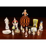 A Small Group of Vintage Ornamental Figures, A Nursery Clock,