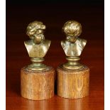 A Pair of Small Bronze Cherubic Busts stamped F.
