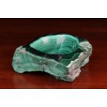 A Malachite Ashtray/Dish. The specimen block with oval dished centre, 3" (7.