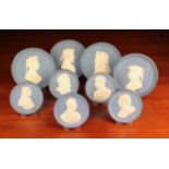 A Group of Nine Plaster Cast Medallions relief moulded with profile busts defined against a