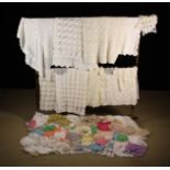 Ten Hand-crocheted Tablecloths and a Quantity of Crocheted Table mats, doylies, a lady's jacket etc,