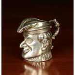 A Small Sterling Silver Jug stamped 930, cast in the form of Mr Punch's Head,
