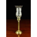 A Brass Candle Lamp with a decorative etched clear glass tulip-head shade on columnar stem and