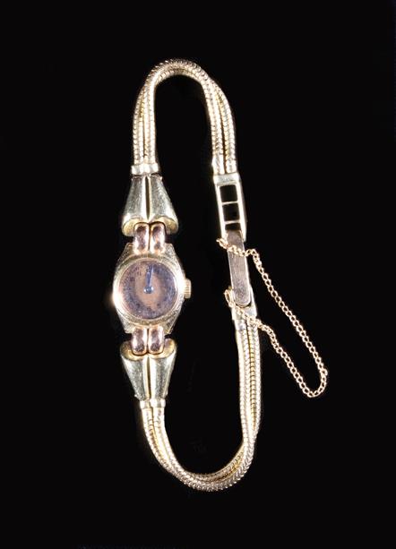 A Lady's 14 Carat Gold Wrist Watch on a twin snake chain bracelet, presented in a Garrard & Co. - Image 2 of 3