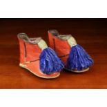 A Pair of Vintage Child's Hand-stitched Red Leather Boots adorned with lapis blue wool tassels to