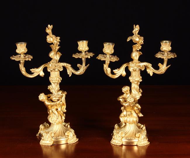 A Pair of French 19th Century French Rococo Gilt Bronze Candelabra.