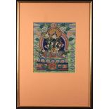 A Tibetan Thangka painted in gouache on fabric with Green Tara surrounded by flowers,