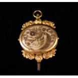 A Fine & Rare Early 19th Century Gold Mounted Memorial Watch Fob with a double sided oval locket
