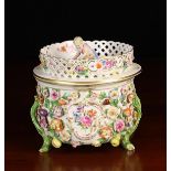 A Meissen Jardiniere encrusted with polychromed flowers,