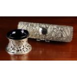An Embossed Silver Penbox and a Blue Glass Condiment Dish in a Pierced Silver Holder,