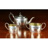 A Small Victorian Silver Three Part Teaset hallmarked Sheffield 1883 with maker's punch for Henry