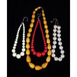 Four Boldly Coloured Necklaces, strung with large beads.
